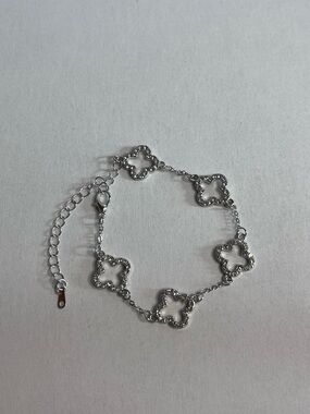 Silver Floral Clover Link Bracelet with Sparkling Accents